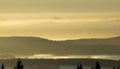 Scenic view of the hills at sunrise hidden in fog. Bavarian Forest, Germany Royalty Free Stock Photo