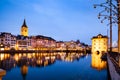 scenic view of historic Zurich city center with famous Fraumunster and Grossmunster Churches and river Limmat at Lake Zurich,