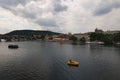 Scenic view of historical center of Prague, Charles Bridge and Vltava river, Saint Vitus Cathedral at cloudy summer day Royalty Free Stock Photo