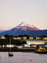 Scenic view of houses on shoreline against Mount Fuji, Japan at twilight Royalty Free Stock Photo