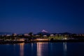 Scenic view of houses on shoreline against Mount Fuji, Japan at twilight Royalty Free Stock Photo