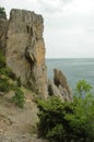 Scenic view of huge cliffs and sea. Sea bay surrounded by rocky mountains. The Black Sea coast is surrounded by rocks