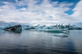 Scenic view of the Jokulsarlon Glacier Lagoon in Iceland with the reflection of clouds in the water
