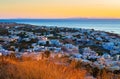 Scenic view of Kamari resort village at sunrise Santorini island Greece