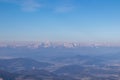 Scenic view of Karawanks (Karawanken) mountain range at early morning after sunrise seen from Saualpe, Lavanttal Alps Royalty Free Stock Photo