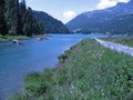 Scenic view of Lake Champfer surrounded by mountains and forests near St Moritz, Switzerland