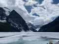 Scenic view of Lake Louise in mountains of Banff National Park, Alberta, Canada on a cloudy day Royalty Free Stock Photo