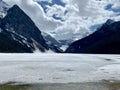 Scenic view of Lake Louise in mountains of Banff National Park, Alberta, Canada on a cloudy day Royalty Free Stock Photo