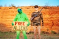 Scenic view of the life of aliens in the USA with a request to give freedom along with a military boy mannequin in the photo