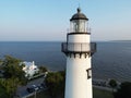 Scenic view of a lighthouse against the sea on St. Simons Island, Georgia, USA Royalty Free Stock Photo