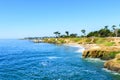 Scenic view of Lighthouse Field State Beach with rocky cliffs, tranquil waves, and a peaceful, sandy shore Royalty Free Stock Photo