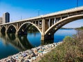 Scenic view of the long Broadway Bridge above a river In Saskatoon Canada Royalty Free Stock Photo