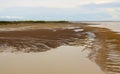 Scenic view of Mudflats at Derby Wharf, Western Australia on a cloudy afternoon