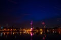 Long exposure of spectacular fire trails and fireworks in the dusk sky caused by fire kites during Uttarayan hindu festival in