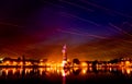 Long exposure of spectacular fire trails in the dusk sky caused by fire kites during Uttarayan hindu festival in india with sacred