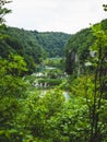 Scenic view of lush green forest and a serene river with waterfalls in Plitvice Lakes National Park Royalty Free Stock Photo