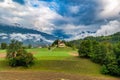 Scenic view of a lush verdant valley from the Bernina Express in Switzerland. Royalty Free Stock Photo