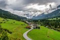 Scenic view of a lush verdant valley from the Bernina Express in Switzerland. Royalty Free Stock Photo