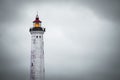 Scenic view of Lyngvig lighthouse on a cloudy day in Denmark