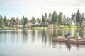 Scenic view of a man fishing on a pier in a big lake in the park. Royalty Free Stock Photo