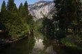 Scenic view of the merced river in the Yosemite valley, with the rocky mountains reflected on the water Royalty Free Stock Photo