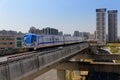 Scenic view of a metro train traveling on elevated rails of Taoyuan Mass Rapid Transit System International Airport MRT System Royalty Free Stock Photo