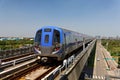 Scenic view of a metro train traveling on elevated rails of Taoyuan Mass Rapid Transit System Royalty Free Stock Photo