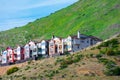 Scenic view of modern townhouses built on steep hillside. Contemporary design of urban living residences in secluded location