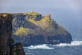 Scenic view of the Moher Tower at Hag\'s Head in summer at sunrise