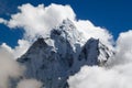 Mount Ama Dablam with big clouds and blue sky, seen from Thok La pass, Everest Base Camp trek, Nepal