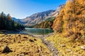 Scenic view of mountain lake at autumn sunny day. Europe, Austria,Tyrol, Lake Obernberg, Stubai Alps Royalty Free Stock Photo