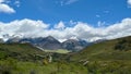 Scenic view of a mountainous green landscape in New Zealand on a bright summer day Royalty Free Stock Photo