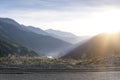 Scenic View Of Mountains Against Sky During Sunrise.