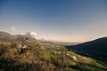 Scenic view of mountains, autumn or winter landscape with colorful hills at sunset. Yellow meadows and snowy mountains of Azerbaij Royalty Free Stock Photo