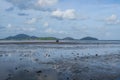 Scenic View Of Mud Beach Against Broken Ship Cloudy Sky. Royalty Free Stock Photo