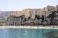 Scenic view of the old coastal town of Tropea, Italy with residential buildings and a sea