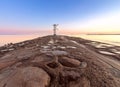 Swinoujscie. The famous stone lighthouse in the form of a windmill at dawn. Royalty Free Stock Photo