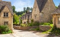 Scenic view on old street in sunny morning , Bibury, Gloucestershir, England, UK Royalty Free Stock Photo