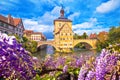 Scenic view of Old Town Hall of Bamberg Altes Rathaus with two bridges over the Regnitz river flower view Royalty Free Stock Photo