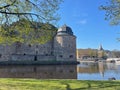 Scenic view of Orebro Castle near a lake on a sunny day in Sweden Royalty Free Stock Photo