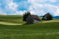 Scenic view over the German countryside around the village Kappel with two old wooden sheds over the green hills