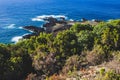 Scenic view over the ocean and rocks in the water at the west coast of Sao Miguel Island, Azores, Portugal Royalty Free Stock Photo