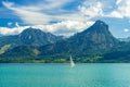 Scenic view over Wolfgangsee with a lonely sailing boat Royalty Free Stock Photo