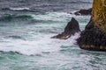 Scenic view of Pacific ocean waves against a rocky cliff in Yaquina Nature Preserve, Oregon