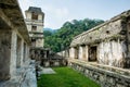 Scenic view of Palenque ruins and pyramids under blue cloudy sky in Mexico Royalty Free Stock Photo