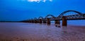 Scenic view of Parallel railway bridges on flooded Godavari river in Vijayawada, Andhrapradesh, India
