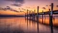 Scenic view of a pier on the sea at golden sunset