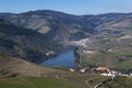 Scenic view of the Pinhao village with terraced vineyards and the Douro River and the Douro Valley, in Portugal Royalty Free Stock Photo
