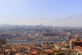 Scenic view of Porto, Portugal from the tower Cl rigos Church. River Douro. Orange roofs of the houses