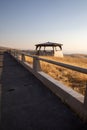 Scenic view of Prairie and stark desert landscape and a gazebo, a pavilion at Deadman Pass in Oregon